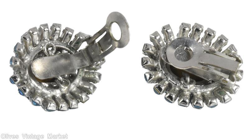 Schreiner oval shaped 2 surrounding level domed earring large oval center 12 small surrounding stone 2nd round small baguette ice blue clear faceted large oval center ice blue small chaton aqua clear small baguette silvertone jewelry