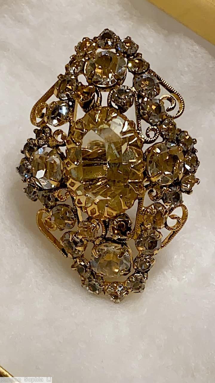 Schreiner diamond shaped ring large oval center stone 4 large chaton scrollwork champagne faceted large oval stone smoky goldtone jewelry