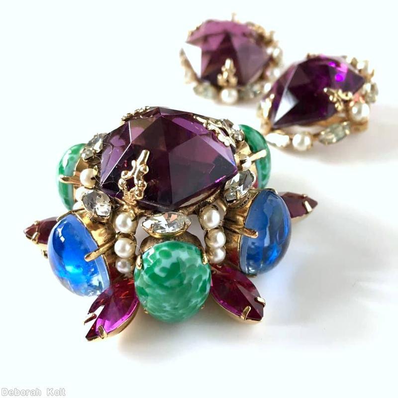 Schreiner mile high domed round pin 6 large oval side stone large round top stone 6 navette large hexagonal rose cut purple stone blue large oval cab large oval speckled jade cab crystal navette faux pearl fuschia large navette goldtone jewelry